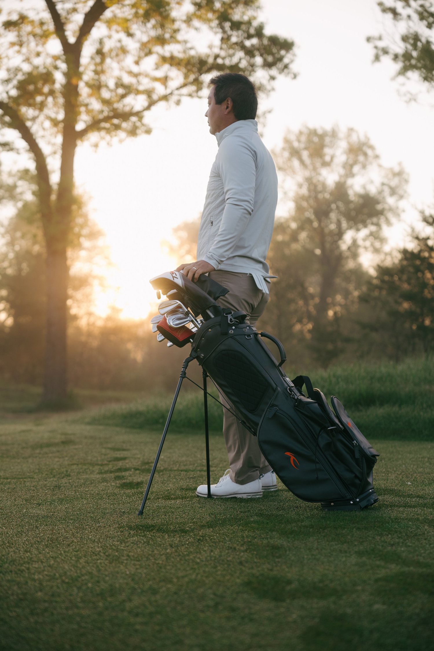 Player and bag at sunrise