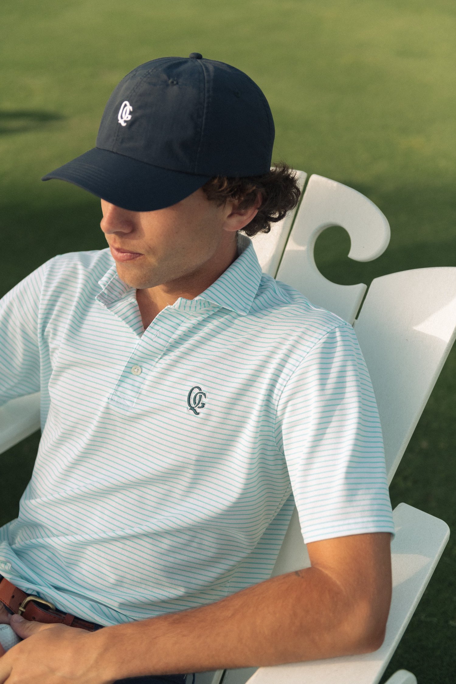 Polo portrait in an Adirondack chair